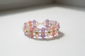Finished beaded bracelet in pastel pink, lavender, white and gold beads